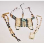 NAVAJO/NATIVE AMERICAN; a bone white metal and turquoise neckpiece, two carved bone necklaces, one