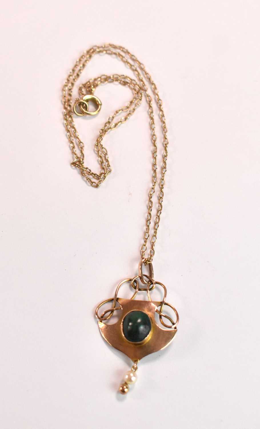 IN THE MANNER OF MURRLE BENNETT; a 9ct gold turquoise and seed pearl Art Nouveau pendant suspended - Image 2 of 3