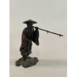 A bronzed metal figure of a Japanese farmer, height 22cm.