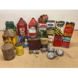 A collection of automobilia to include oil drums, oil cans, headlamps, badges, for Elf, Shell,