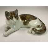 WINSTANLEY; a cat in recumbent position, signed Mike Hinton to base, length 33cm.