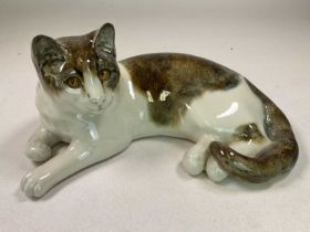 WINSTANLEY; a cat in recumbent position, signed Mike Hinton to base, length 33cm.