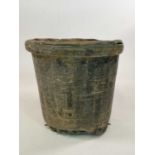 An elephant hide bucket, height 41cm, diameter 44cm.