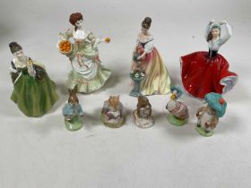ROYAL DOULTON; four figures of ladies and five Beatrix Potter characters, all with boxes. Comprising