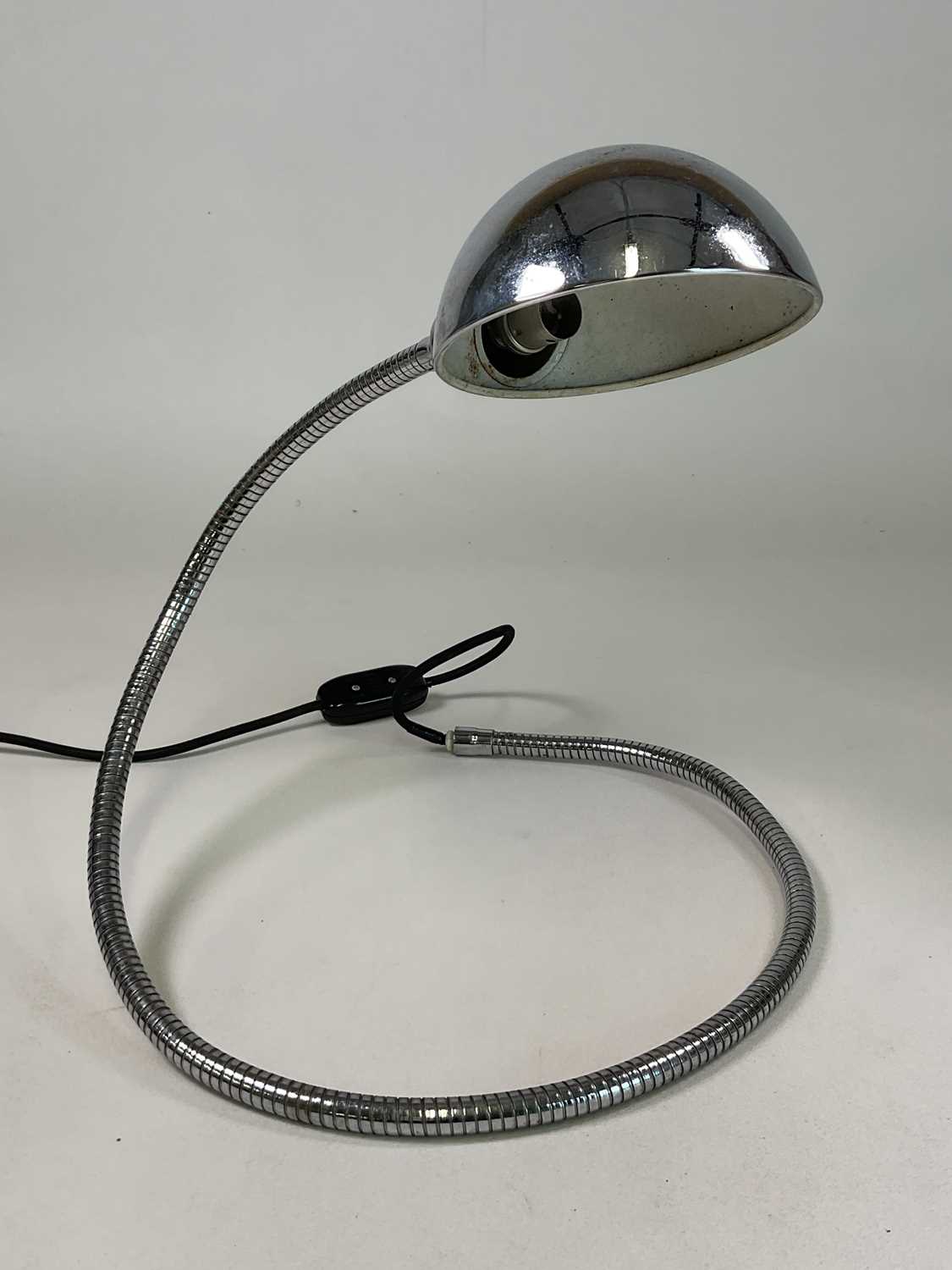 A mid 20th century chrome adjustable coil desk lamp.