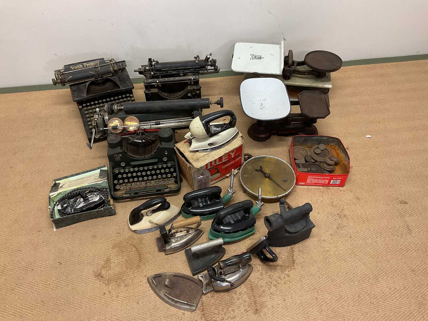 A collection of typewriters, scales including Avery shop scales and weights, vintage irons and other - Image 2 of 2