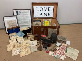 A wooden trunk of collectors' items, to include cigarette card collection, stamp collection, a