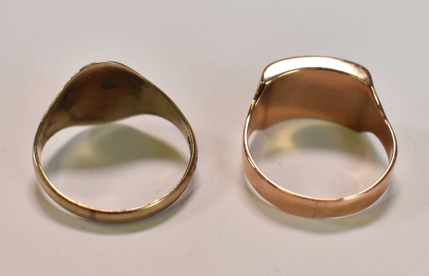 A 9ct yellow gold signet ring with traces of engraved initials, size U, and a yellow metal ring with - Image 2 of 3