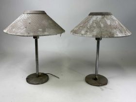 A pair of metal Swedish table lamps with metal mesh shades, height 56cm.