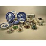 A quantity of mixed ceramics including cabinet cups, 'Willow' pattern plates and platters and