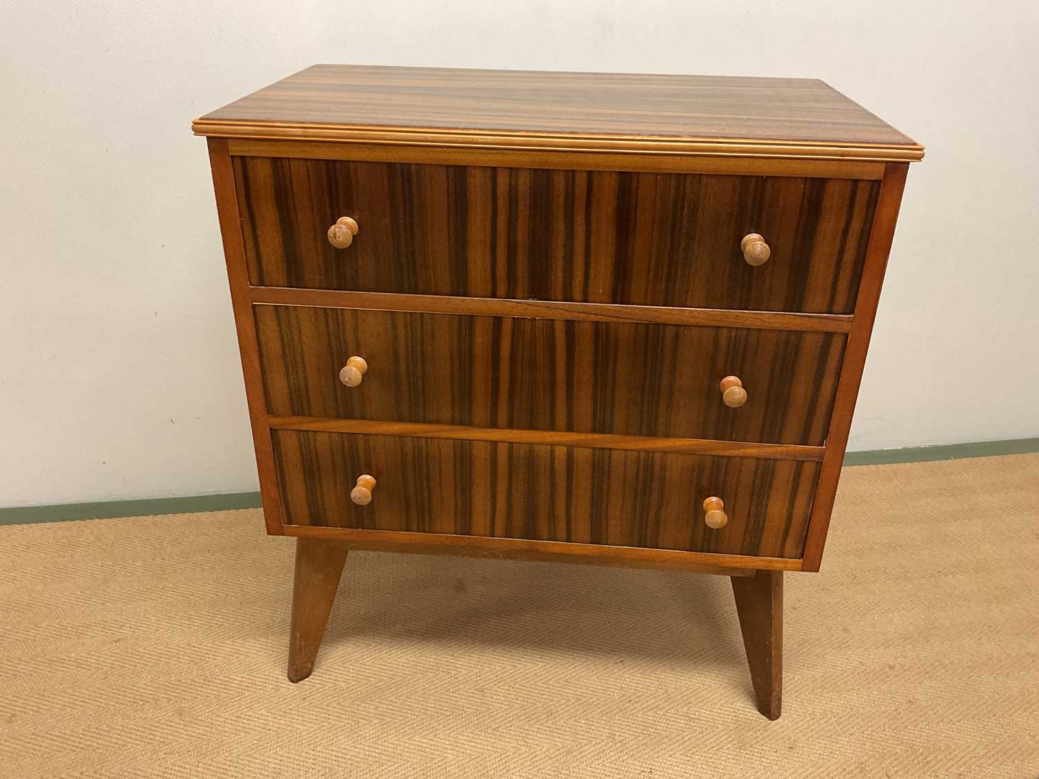 MORRIS OF GLASGOW; a Cumbrae chest of drawers, by Neil Morrisin the 1970s, on raised legs with three
