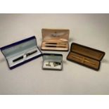 A collectors' lot comprising a boxed Waterman pen, a boxed Parker pen, a boxed Parker 61 set of a