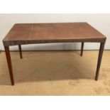 A mid 20th century Danish teak extending dining table, height 72cm, width 135cm, depth 90cm,