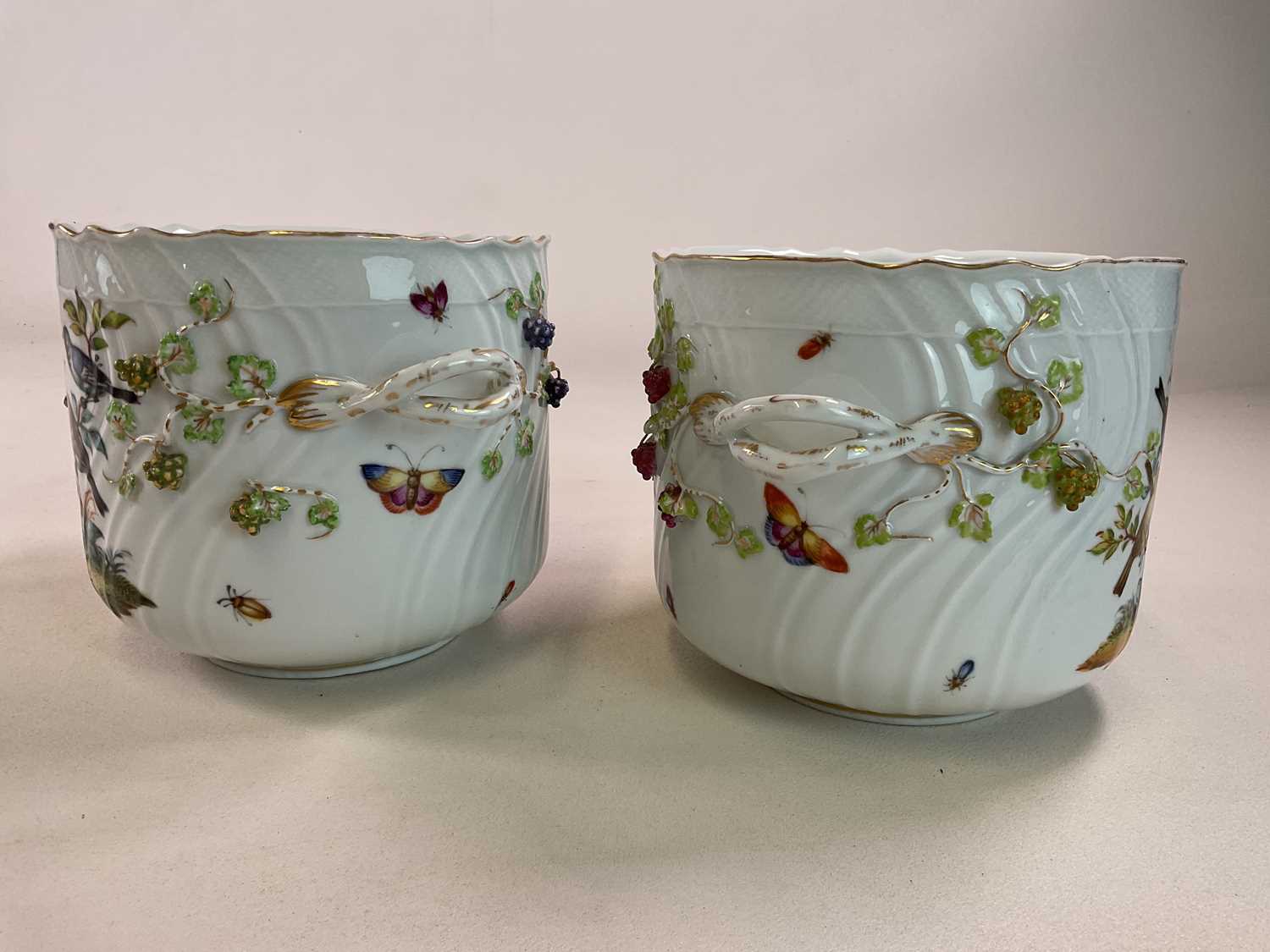 A large pair of circa 1900 German porcelain twin handled jardinières, each decorated with exotic - Image 2 of 3