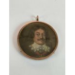 X A circular portrait miniature, possibly 17th century Dutch, study of a gentleman with moustache