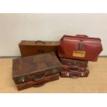 A collection of vintage suitcases (7 )