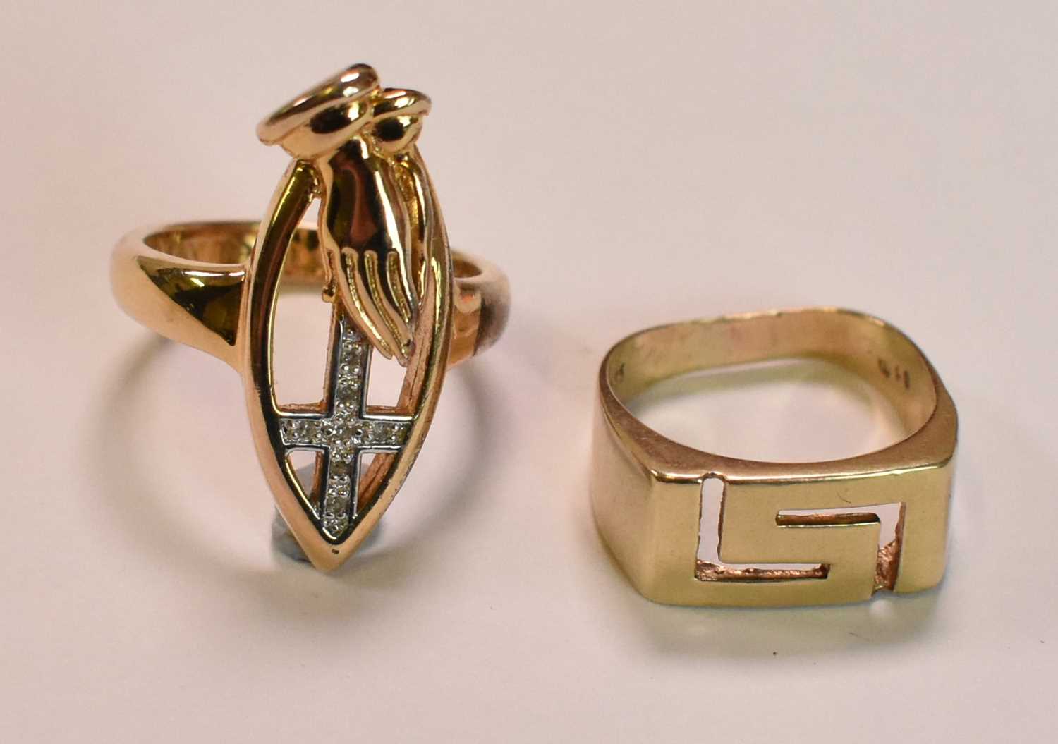A 14ct yellow gold Greek key designed ring, size J 1/2, approx 3.2g, and a yellow metal ring