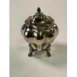 NATHAN & HAYES; a late Victorian hallmarked silver tea caddy of bombe outline with hinged lid and