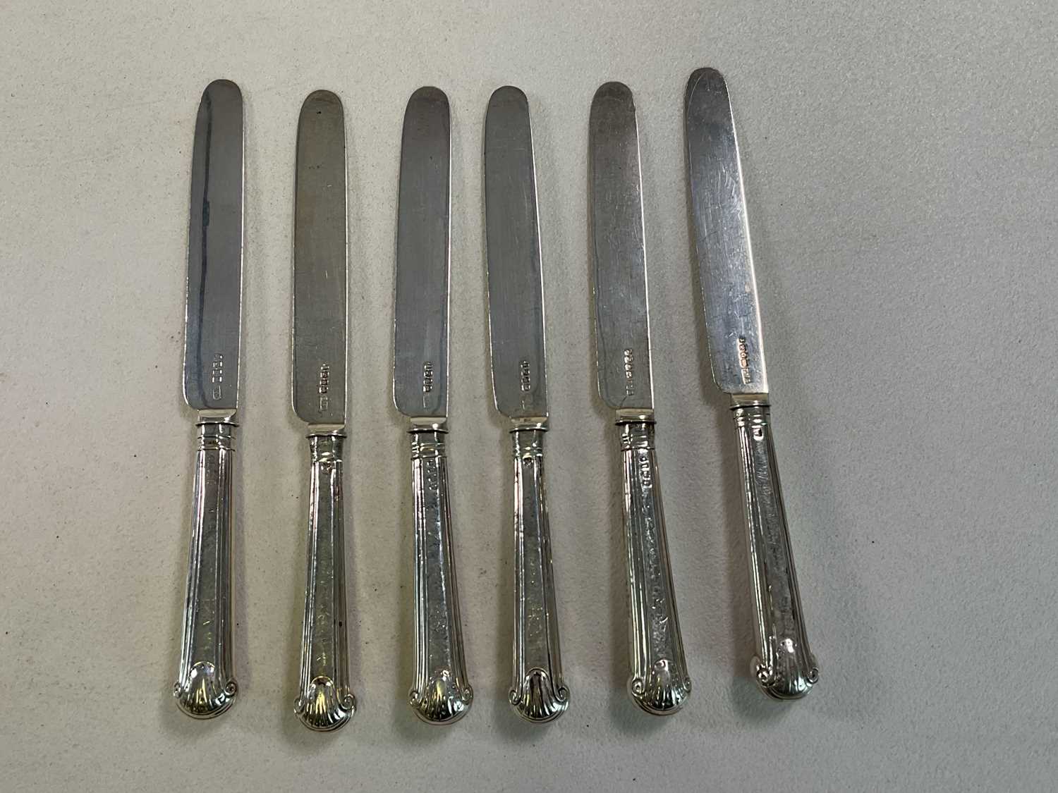 WILLIAM ELEY; a set of three George IV hallmarked silver fiddle pattern tablespoons, a matched set - Image 2 of 12