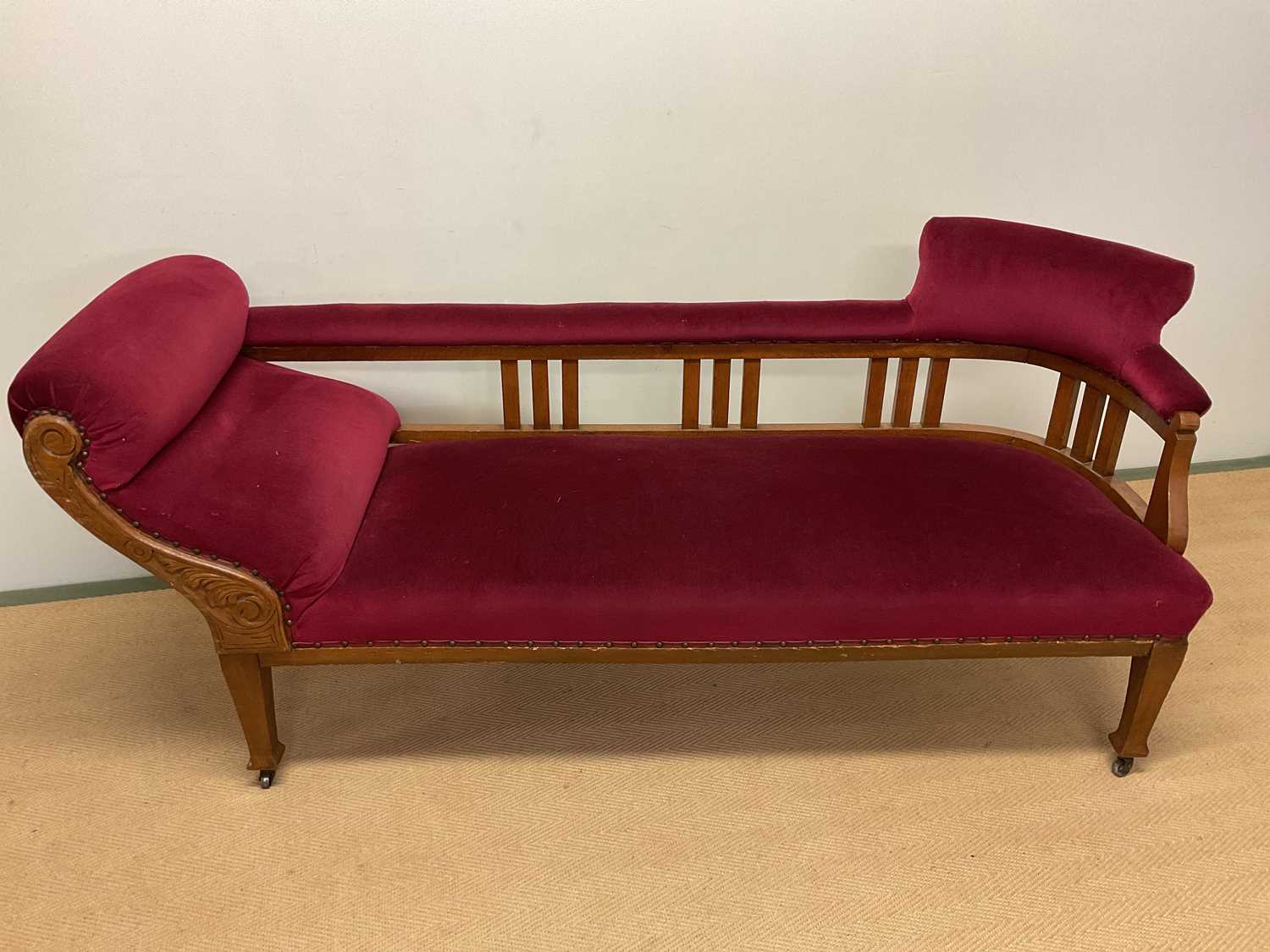 A single scroll arm chaise lounge, height 78cm, width 170cm, depth 60cm.