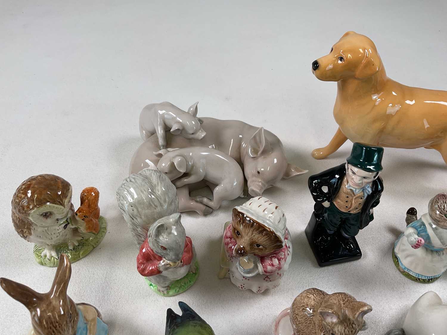 A large group of figures including a Lladrό pig group, a Beswick Norman Thelwell 'Kick-Start' - Image 2 of 3