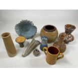 Ten items of various studio ceramic, including pots and vases.