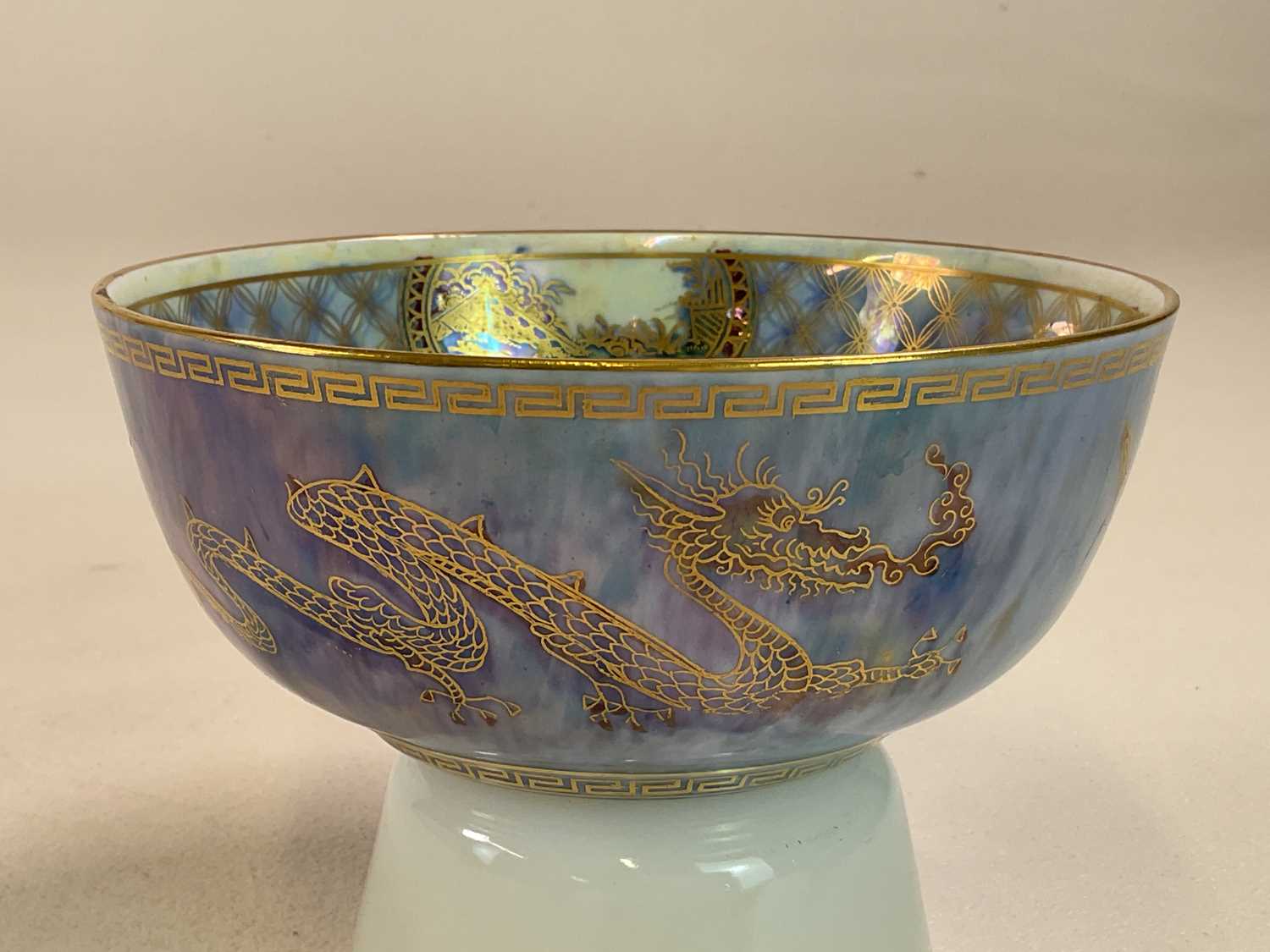WEDGWOOD; a dragon lustre bowl internally painted with three fruit and externally with twin dragons, - Image 2 of 4