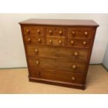 A Victorian Scottish mahogany chest of drawers with an arrangement of three large drawers under four