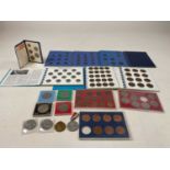 A small collection of British coins and two medals including WWI Victory Medal issued to Private