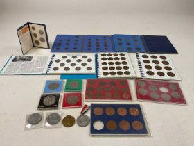 A small collection of British coins and two medals including WWI Victory Medal issued to Private