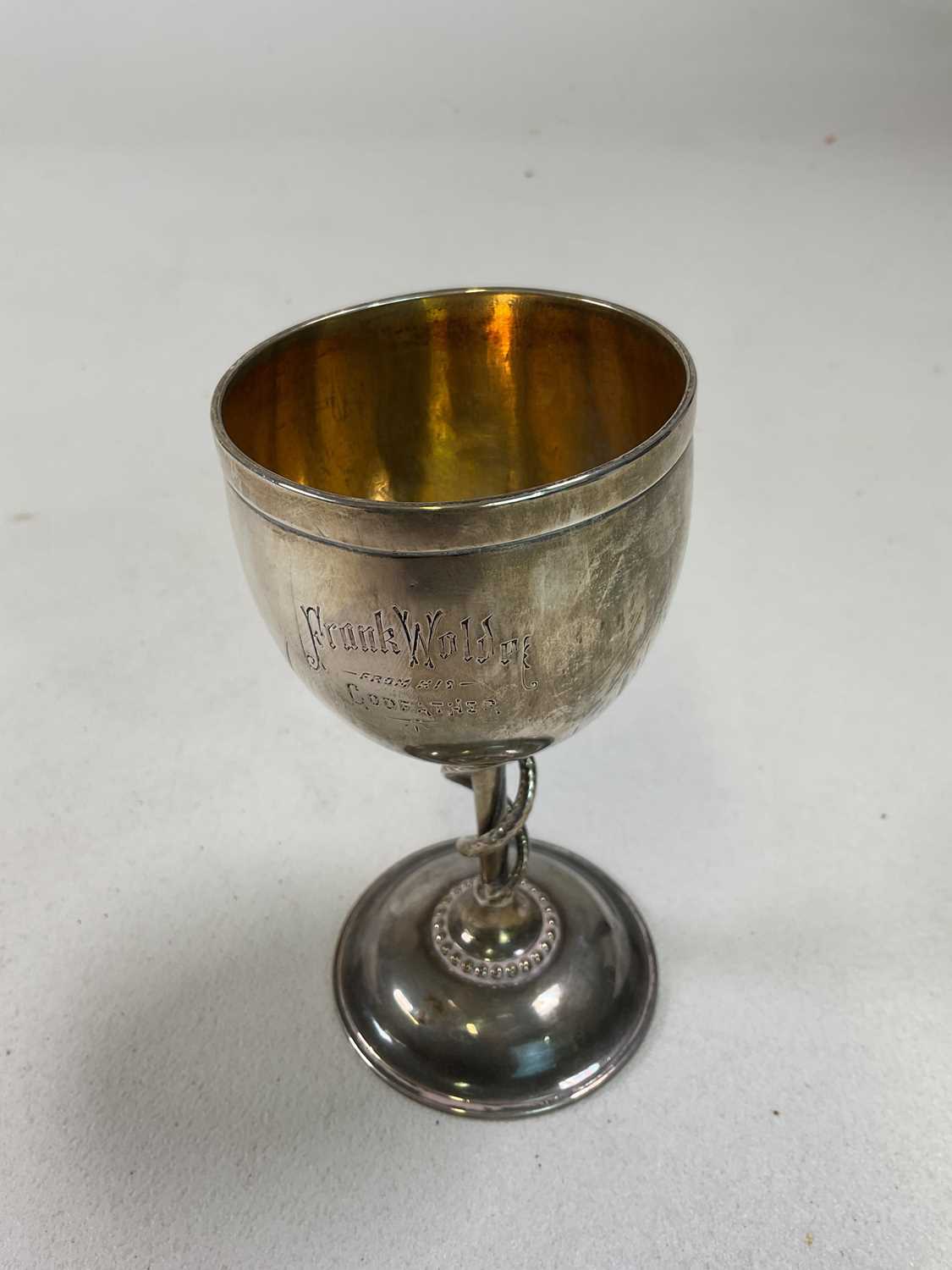 A Victorian hallmarked silver christening goblet, the bowl with presentation inscription above