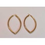 A pair of 9ct yellow gold hollow hoop earrings, combined approx 5.2g.