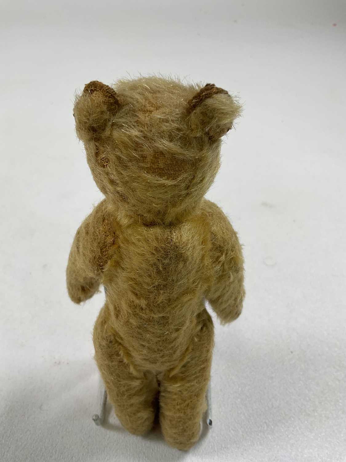 A small vintage mohair Teddy bear with glass eyes and a hump back, stitched nose, paws and feet, - Image 6 of 6