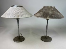 A pair of metal Swedish table lamps with metal mesh shades, height 56cm.