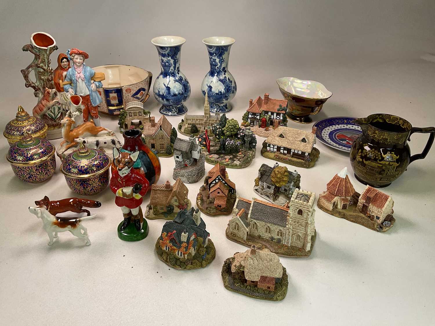 A quantity of collectors' and other ceramic items including Beswick fox hound and fox, Poole pottery