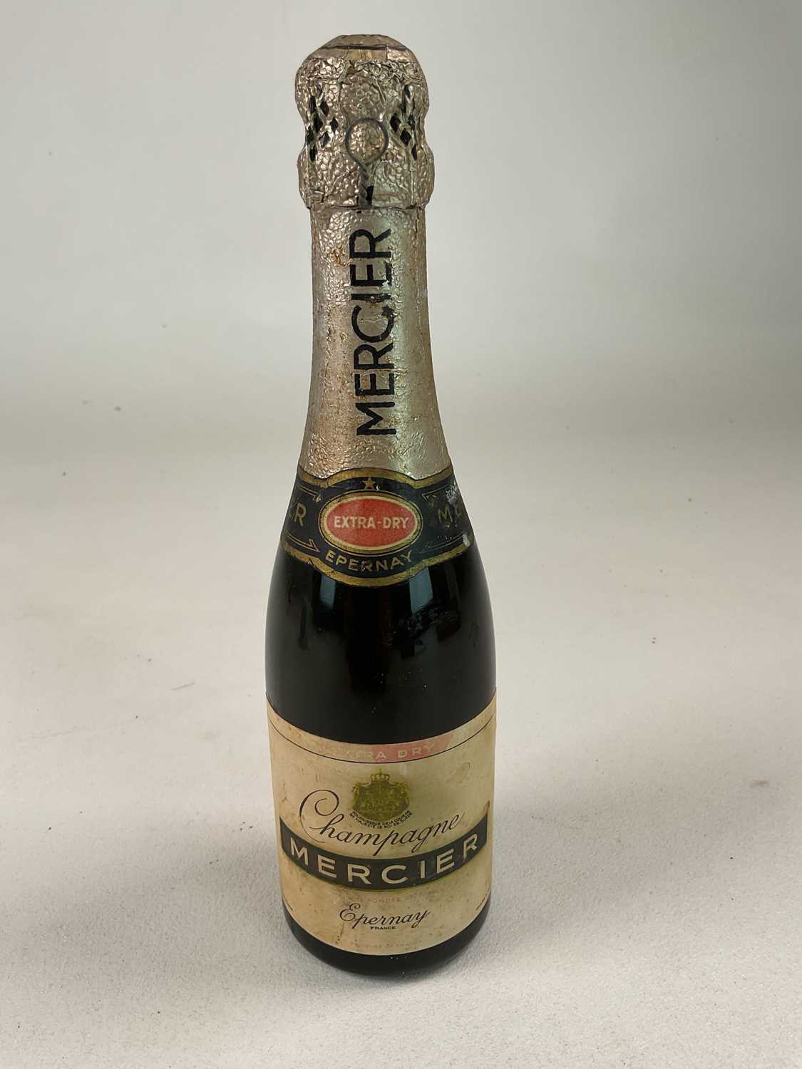 CHAMPAGNE; a half bottle of Mercier Champagne, extra dry.