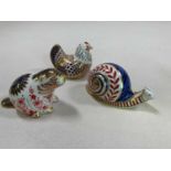 ROYAL CROWN DERBY; a collection of paperweights including a hen, a snail and a beaver. Condition