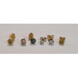 A group of single stone ear studs comprising two round brilliant cut diamonds, each weighing