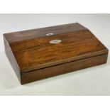 An early Victorian rosewood travelling writing slope, with engraved initials to a mother of pearl