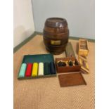 A Remy Martin games barrel and other gaming items including box of wooden dominoes, a box of