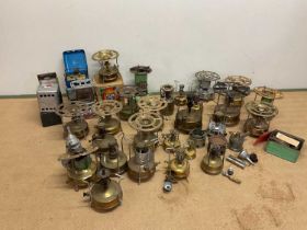 A large quantity of Primus stoves and others including brass example, various Swedish and British