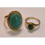 A 9ct yellow gold turquoise cabochon oval dress ring, size L, and a small 9ct yellow gold dress ring