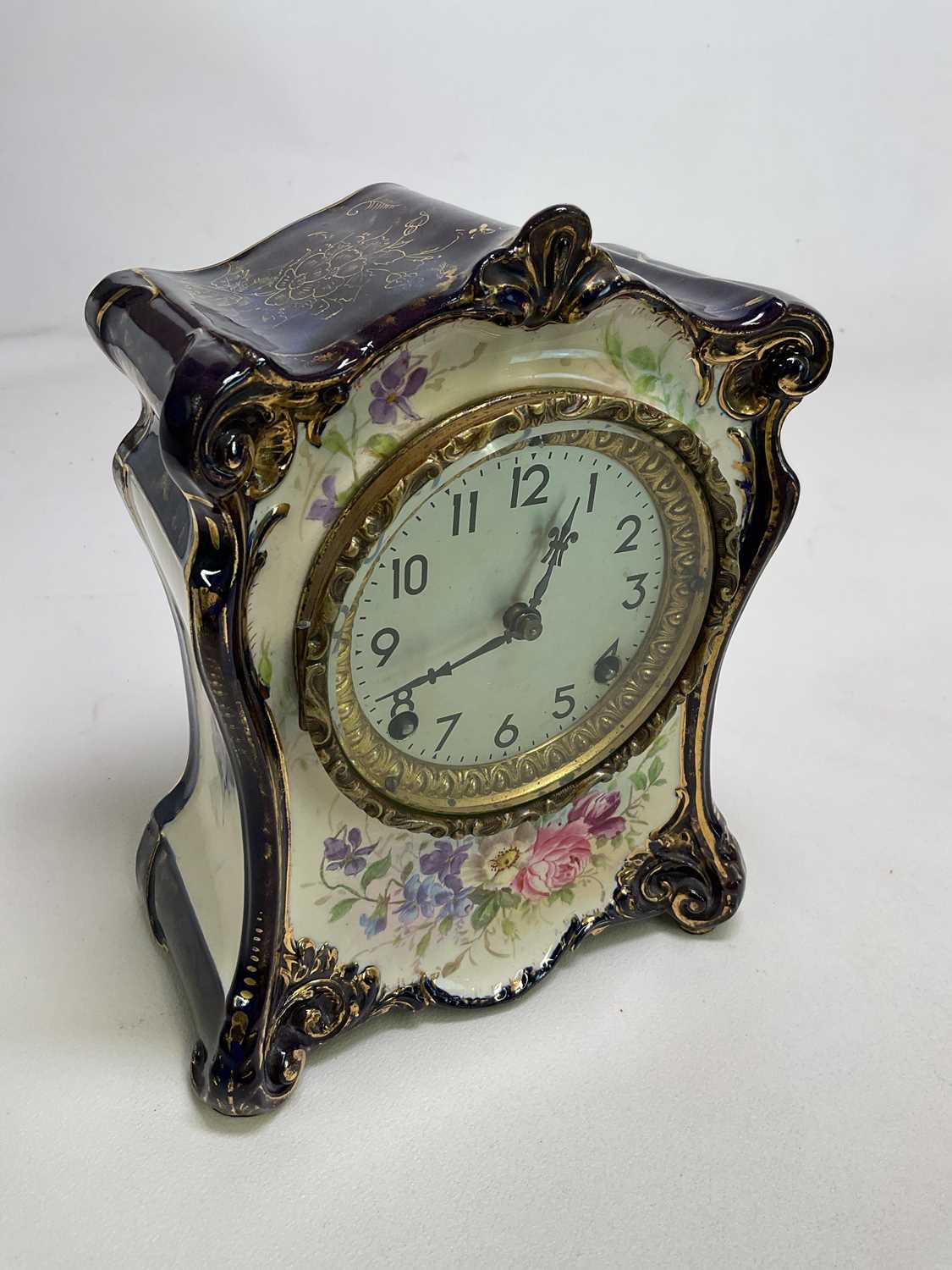 An early 20th century gilt heightened and floral decorated porcelain mantel clock with Arabic - Image 2 of 5