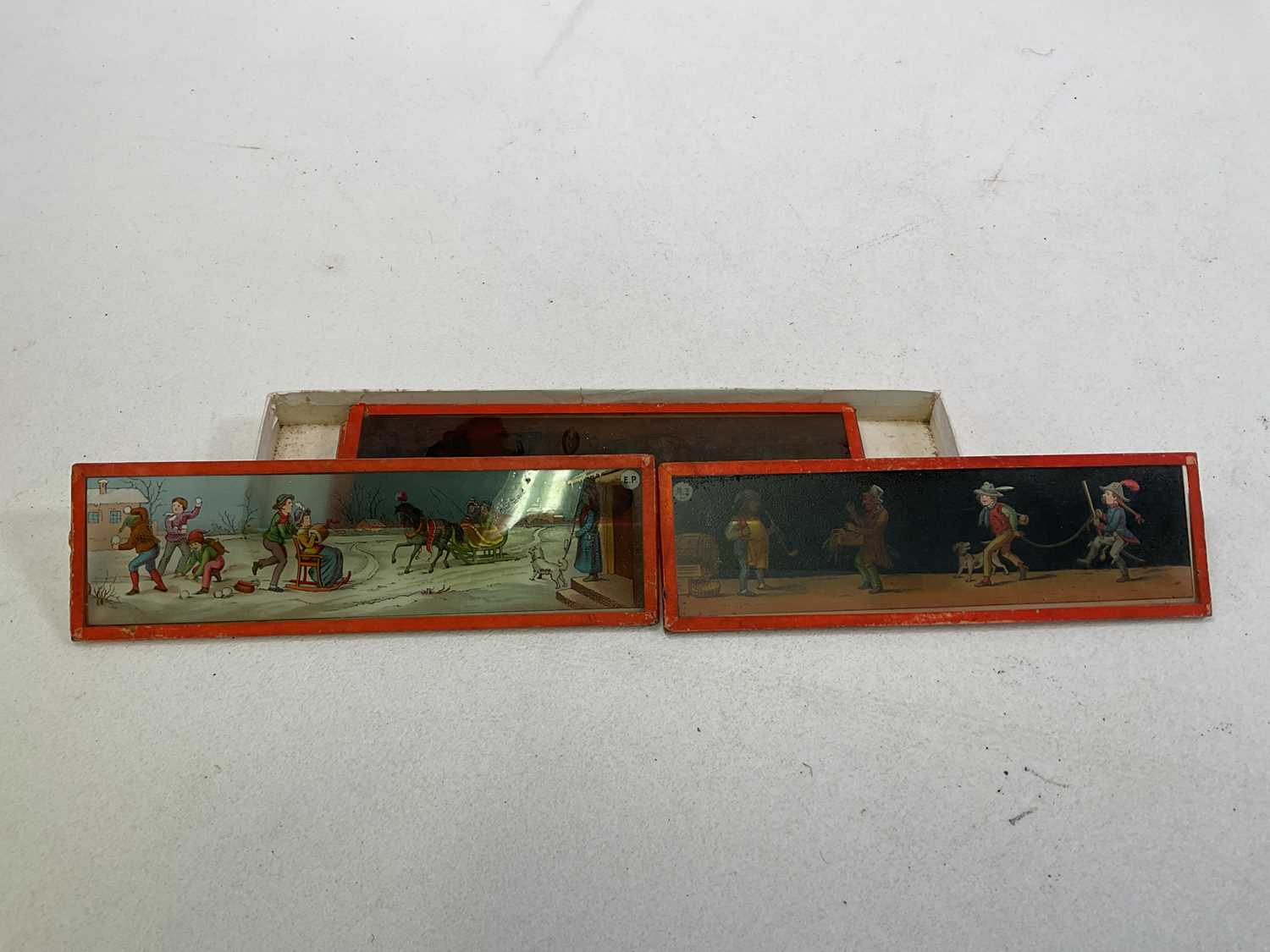 Four magic lanterns in metal cases with a box of slides in wooden frames featuring the Pilgrim's - Image 4 of 6