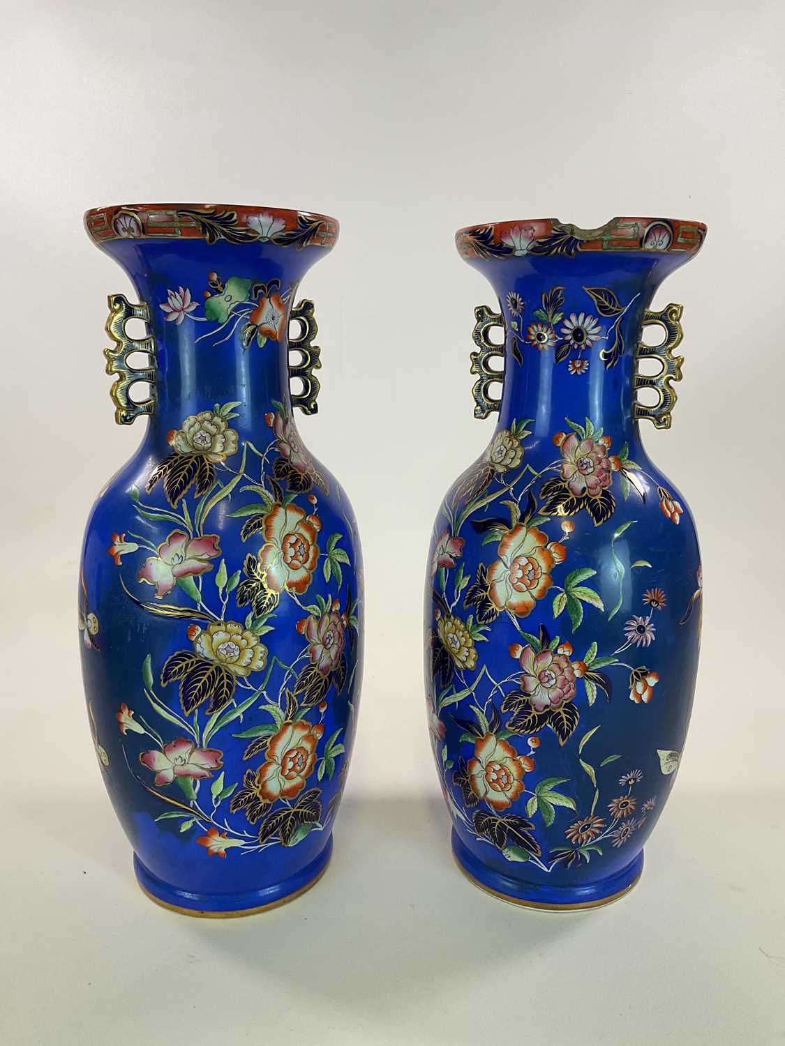 A very large pair of mid 19th century blue ground vases in the Chinoiserie style with stylised - Image 2 of 7