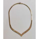 A 9ct tricolour gold necklace, length 39.5cm, approx 20.4g.