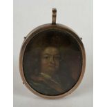 LATE 17TH CENTURY ENGLISH SCHOOL; small oval portrait miniature on card, study of a gentleman,