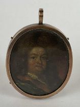 LATE 17TH CENTURY ENGLISH SCHOOL; small oval portrait miniature on card, study of a gentleman,