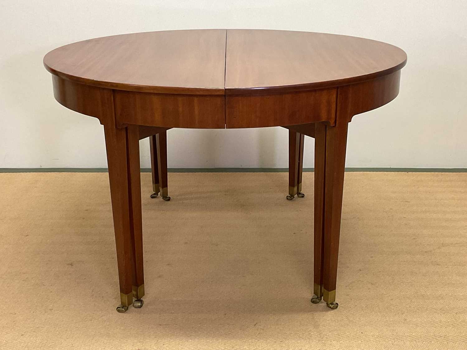 KAARE KLINT FOR RUD RASMUSSEN; a Danish early 20th century circular dining table, with paper label