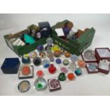 A very large collection of glass paperweights including Caithness examples.